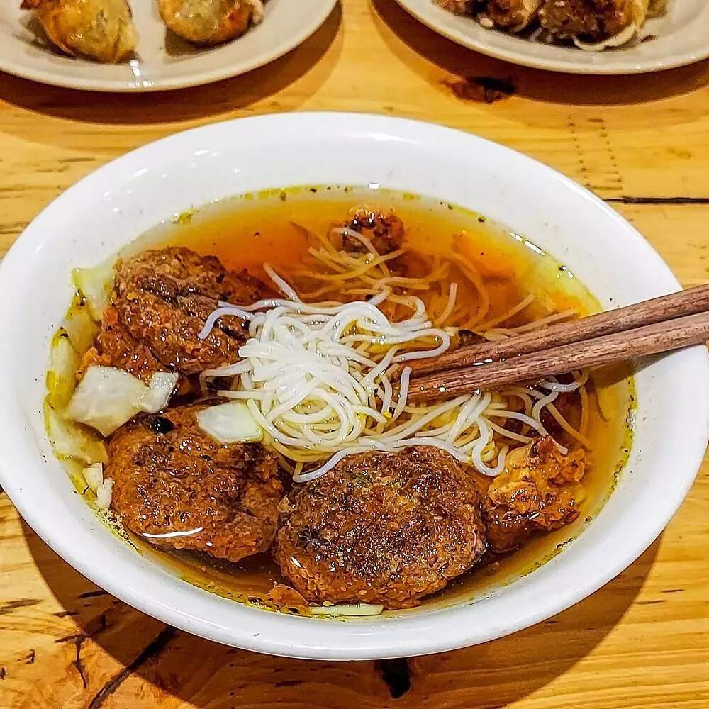 Capture the smoky essence of Hanoi’s Michelin-honored gem